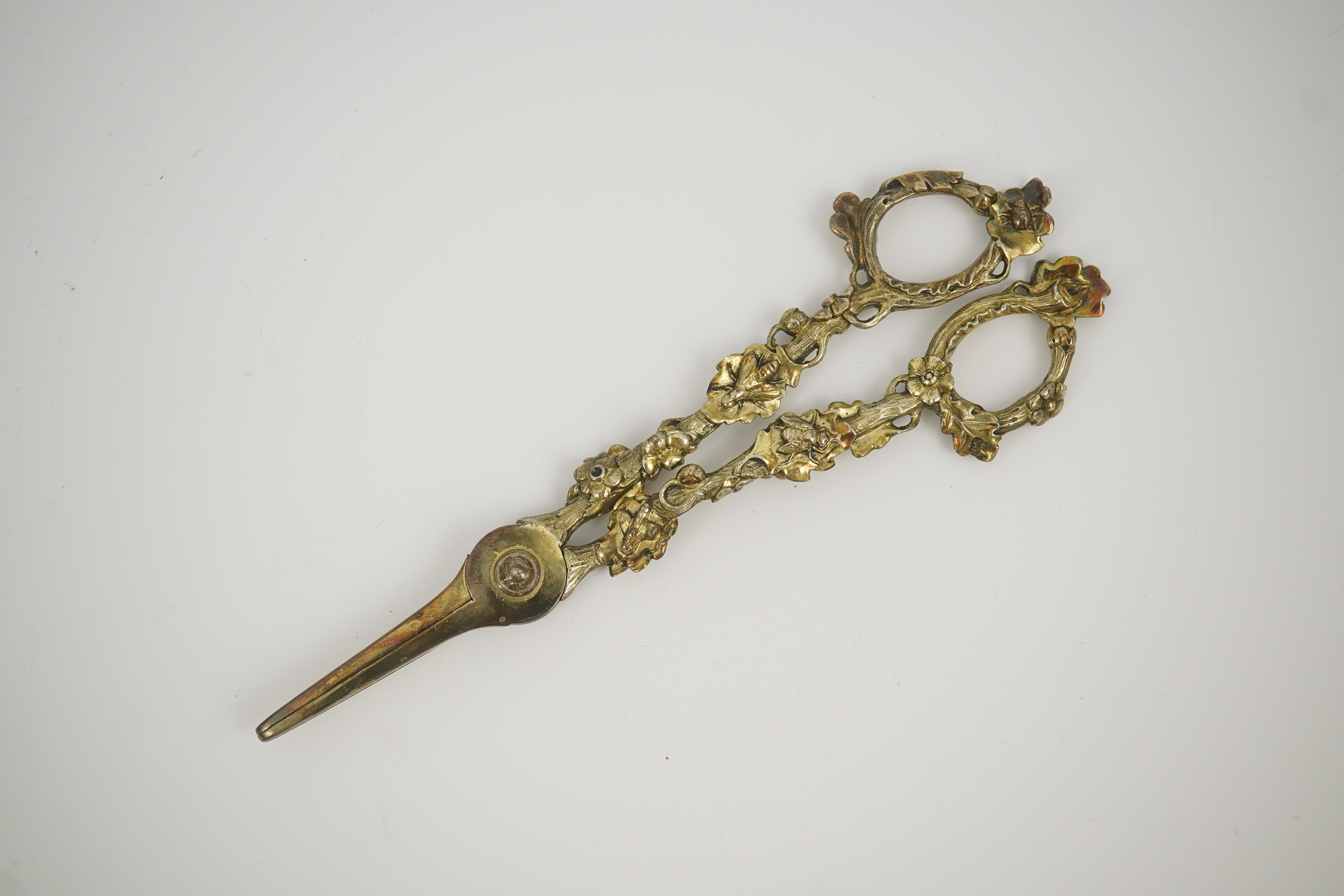 A cased pair of William IV Paul Storr silver gilt grape shears, in later case